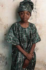 A yoruba Boy In Aso Oke